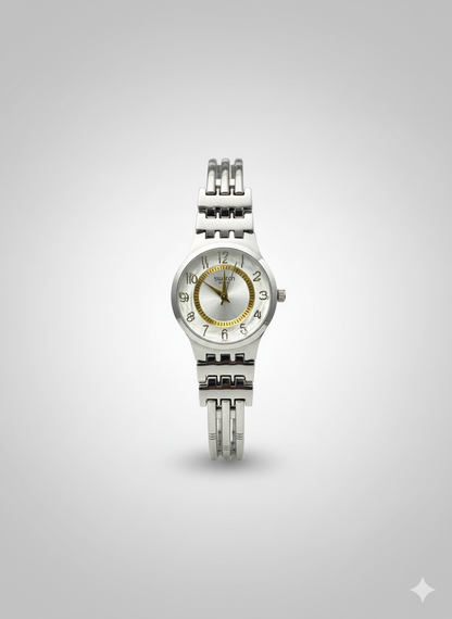 Montre Femme Swatch Argentée et Dorée avec Cristaux